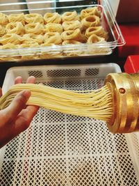 Close-up of person preparing food