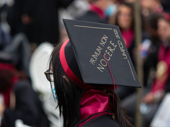 Rear view of a graduating woman 