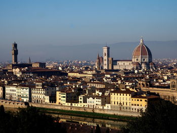 View of cityscape in sunlight