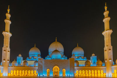 Low angle view of mosque against clear sky