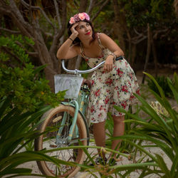 Young woman with bicycle