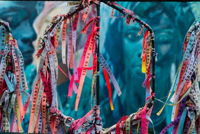 Colored ribbons of senhor do bonfim tied to an iron gate in pelourinho.