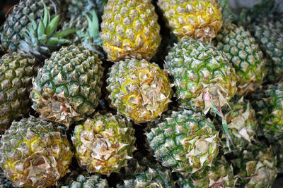 Full frame shot of pineapples for sale in market