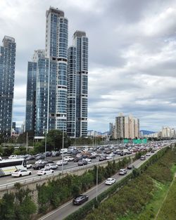 Panoramic view of city buildings against sky