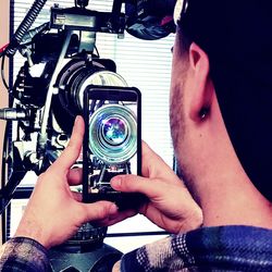 Midsection of man photographing