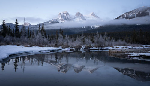 Winter sunrise shot from canadian rockies,three sisters mountain, canmore, canada