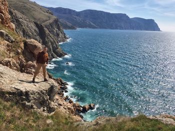 Scenic view of sea and mountains