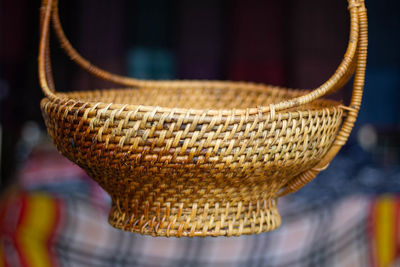 Close-up of wicker basket hanging