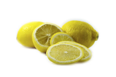 Close-up of lemon slice against white background