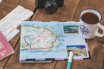 High angle view of coffee cups on table