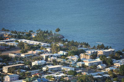 High angle view of townscape by sea