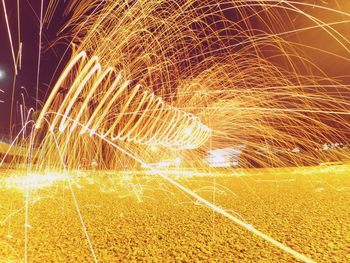 Light trails against sky at night