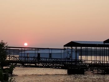 Scenic view of sea against clear sky during sunset