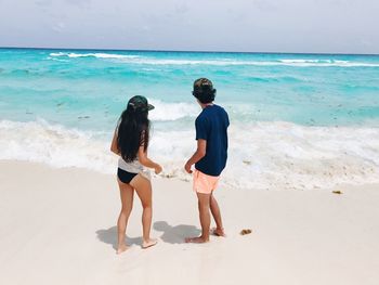 Couple enjoying the ocean view of cancun in mexico 