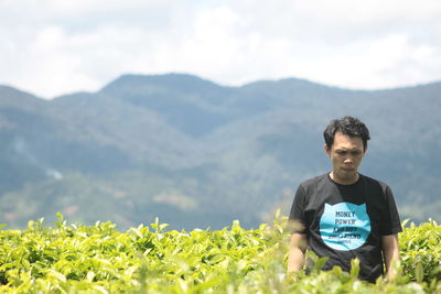 Full length of man on field against mountains