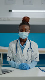 Portrait of female doctor working at clinic