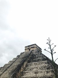 Low angle view of old building against sky