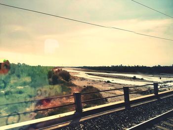 Scenic view of river against sky