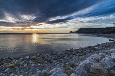 Scenic view of sea against sky during sunset