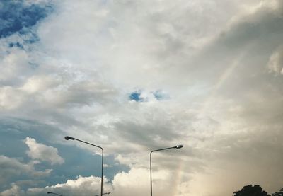 Low angle view of street light against sky