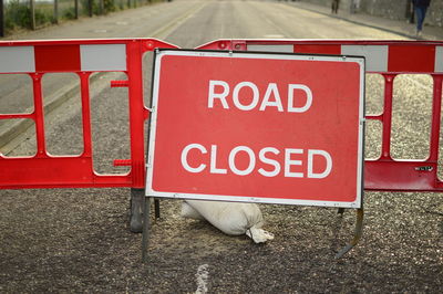 Road closed sign on street