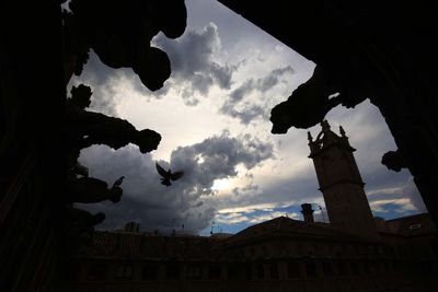 Low angle view of statue against sky