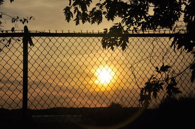 Chainlink fence against sky