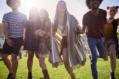 Group of people at party during sunny day