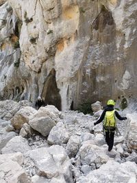 Man standing on rock