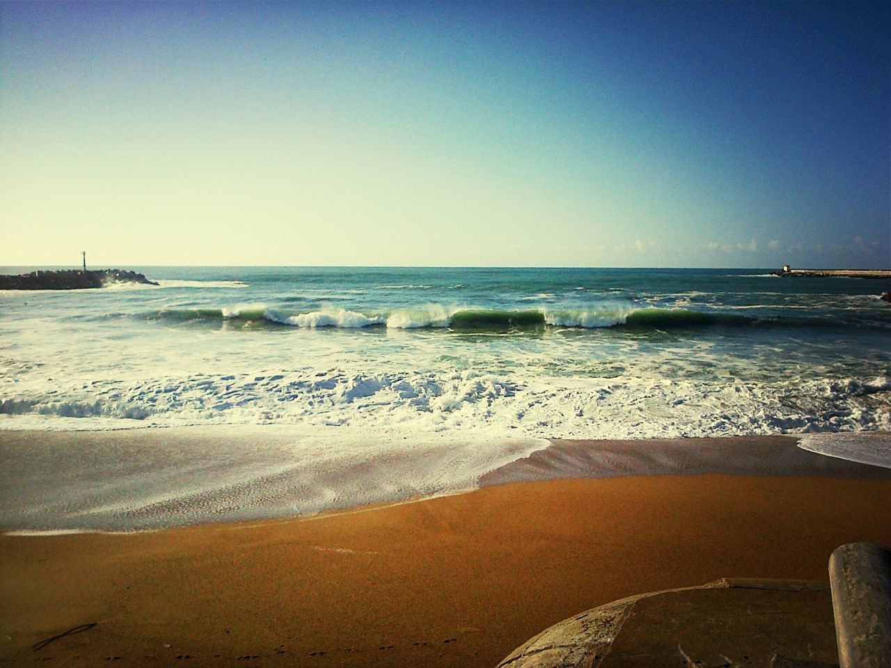 sea, water, beach, horizon over water, clear sky, shore, wave, surf, scenics, copy space, sand, beauty in nature, tranquil scene, tranquility, nature, coastline, idyllic, motion, sky, outdoors