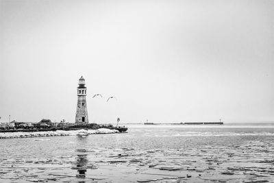 Scenic view of sea against clear sky