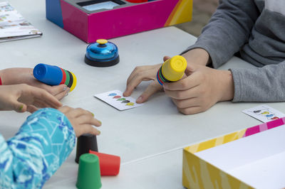 Boy playing with toy on table