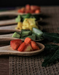 Close-up of chopped fruits on table