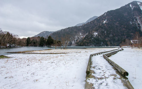 Scenic view of snow covered mountains