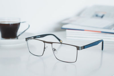 Close-up of eyeglasses on table