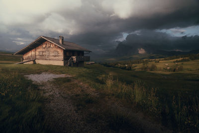 House on field against sky