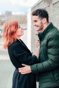 Side view of couple kissing