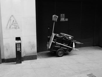 Vintage car on street against building