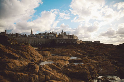 View of castle against cloudy sky