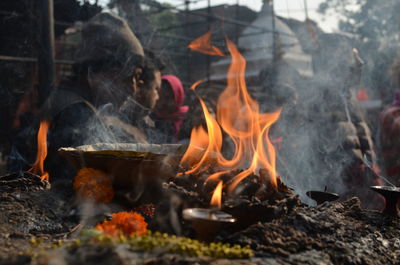 Close-up of fire ignited in temple