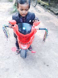 High angle portrait of cute boy riding