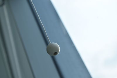 Low angle view of electric light on ceiling