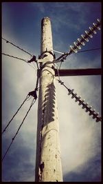 Low angle view of barbed wire