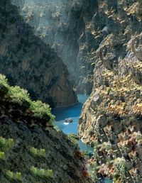 High angle view of rocks by sea