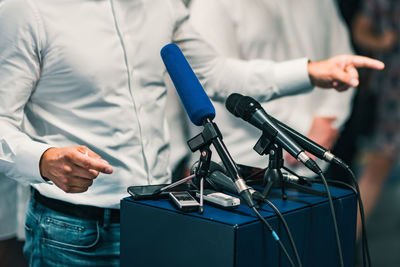 Midsection of businessman during conference