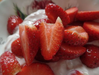 Close-up of chopped strawberries in plate