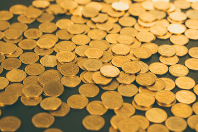 Close-up of coins on table