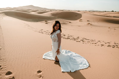 Woman on sand at beach