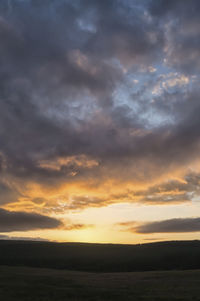 Scenic view of silhouette landscape against sky during sunset