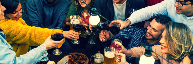 Group of business colleagues stacking hands